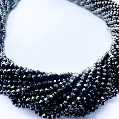 Natural gemstone beads in Black Spinel, 1.7-1.9mm size, ideal for elegant DIY jewellery designs.