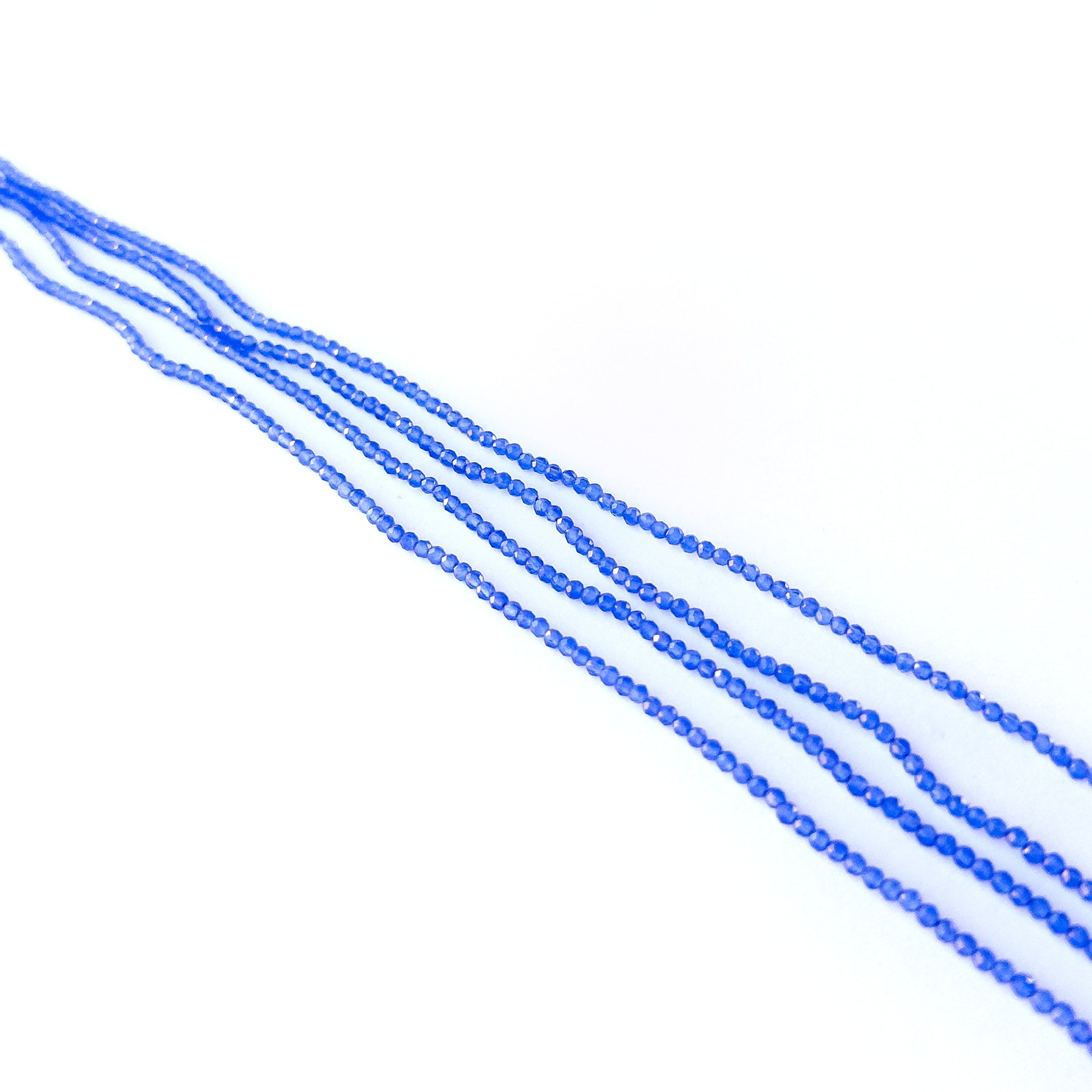 Handmade jewellery components featuring authentic Blue Chalcedony faceted rondelle beads with gentle pastel sparkle.