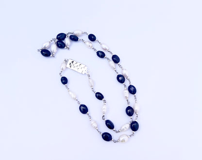 Stone beads necklace featuring 97 carats of smooth oval Sapphire and Pearls in classic hues.