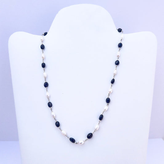 Blue Sapphire and Fresh Water Pearls necklace with smooth oval beads in rich blue and creamy white tones.
