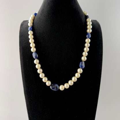 Handmade jewellery showcasing Blue Sapphire beads paired with luminous Freshwater Pearls in a smooth round finish.