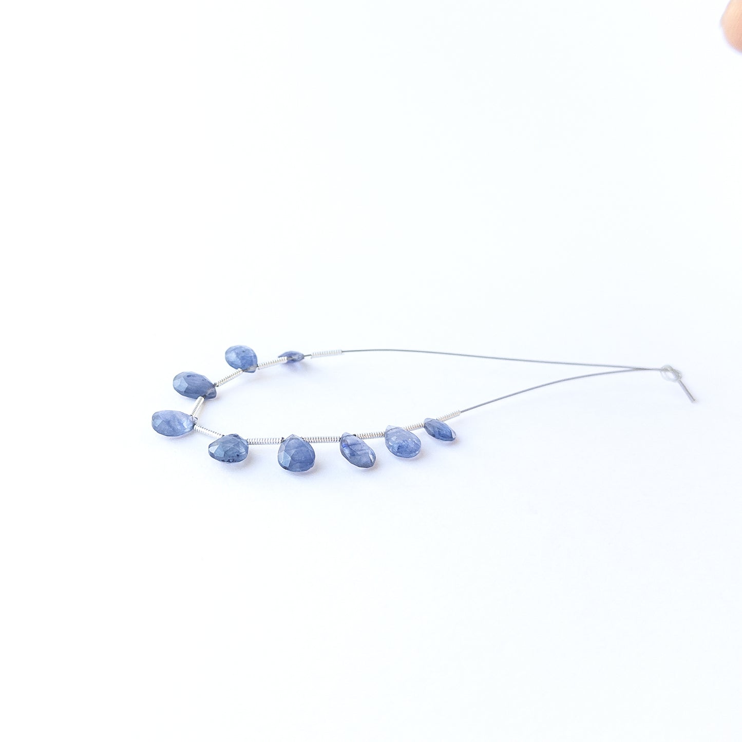Genuine Blue Sapphire gemstone beads with faceted briolette cut, perfect for artisan jewellery designs.