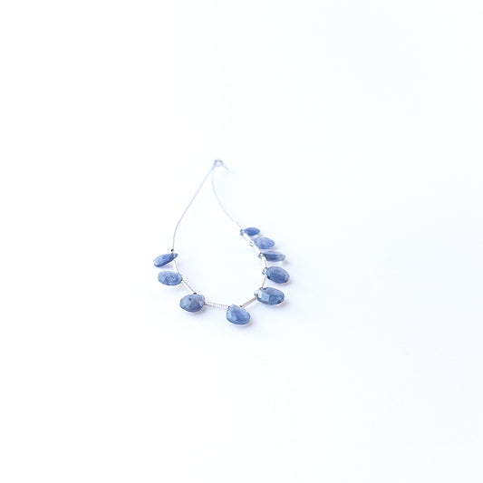 Blue Sapphire faceted briolette beads displaying natural colour variation and premium craftsmanship.