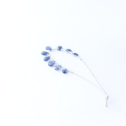 Blue Sapphire briolette beads showcasing natural shine and elegant teardrop faceting for gemstone creators.