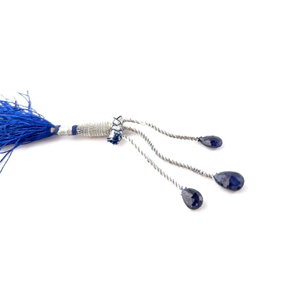 Genuine Blue Sapphire briolette gemstones featuring rich navy tones and crisp faceting across three polished pieces.