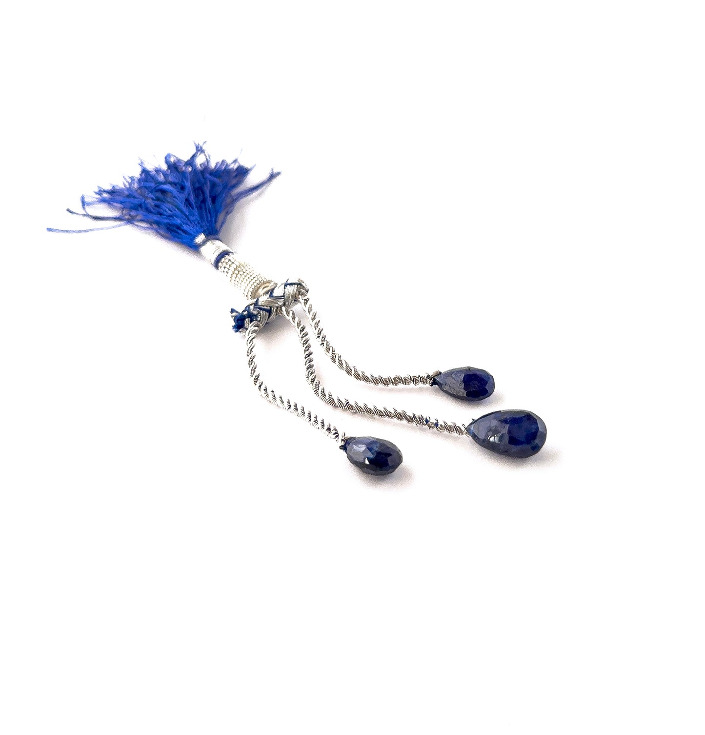 Autthentic Blue Sapphire faceted briolettes in 7–8mm size, showcasing vivid colour saturation and elegant teardrop shaping.