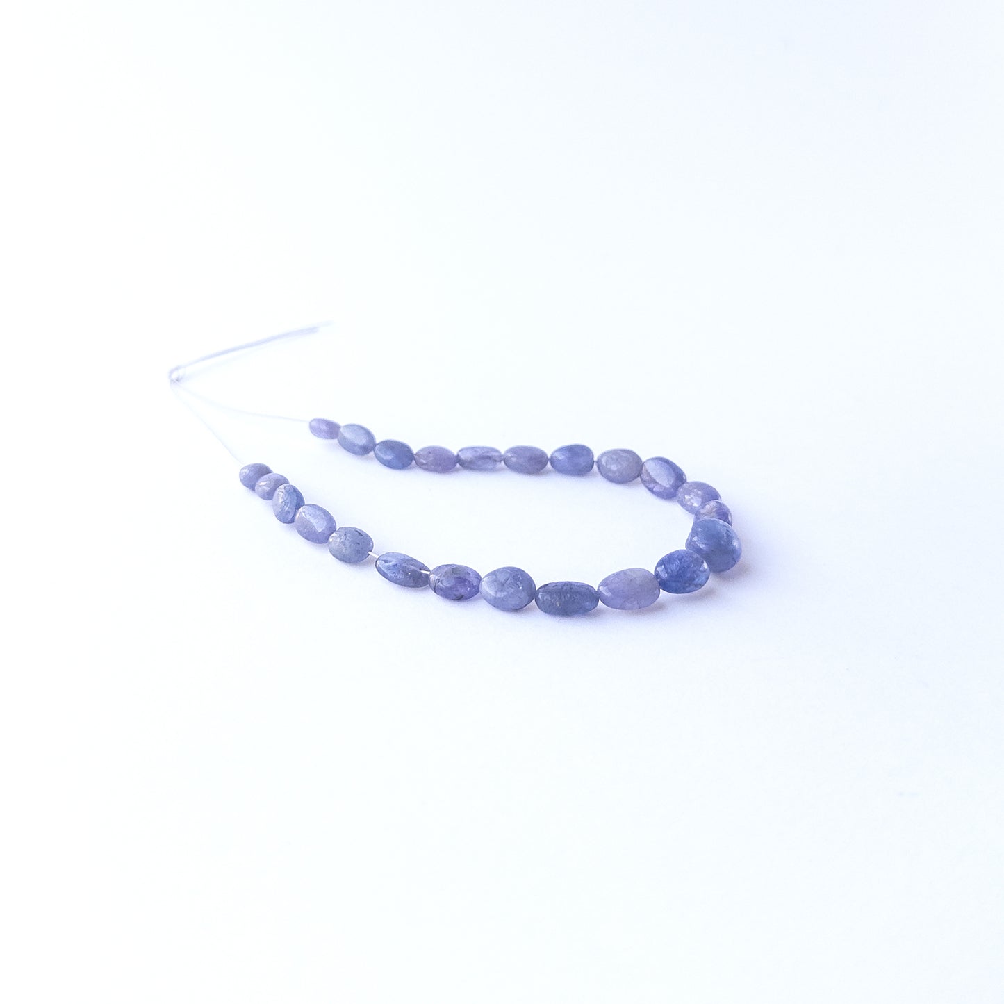 Authentic Blue Sapphire oval stone beads with rich blue tones, ideal for DIY jewellery and beadwork.