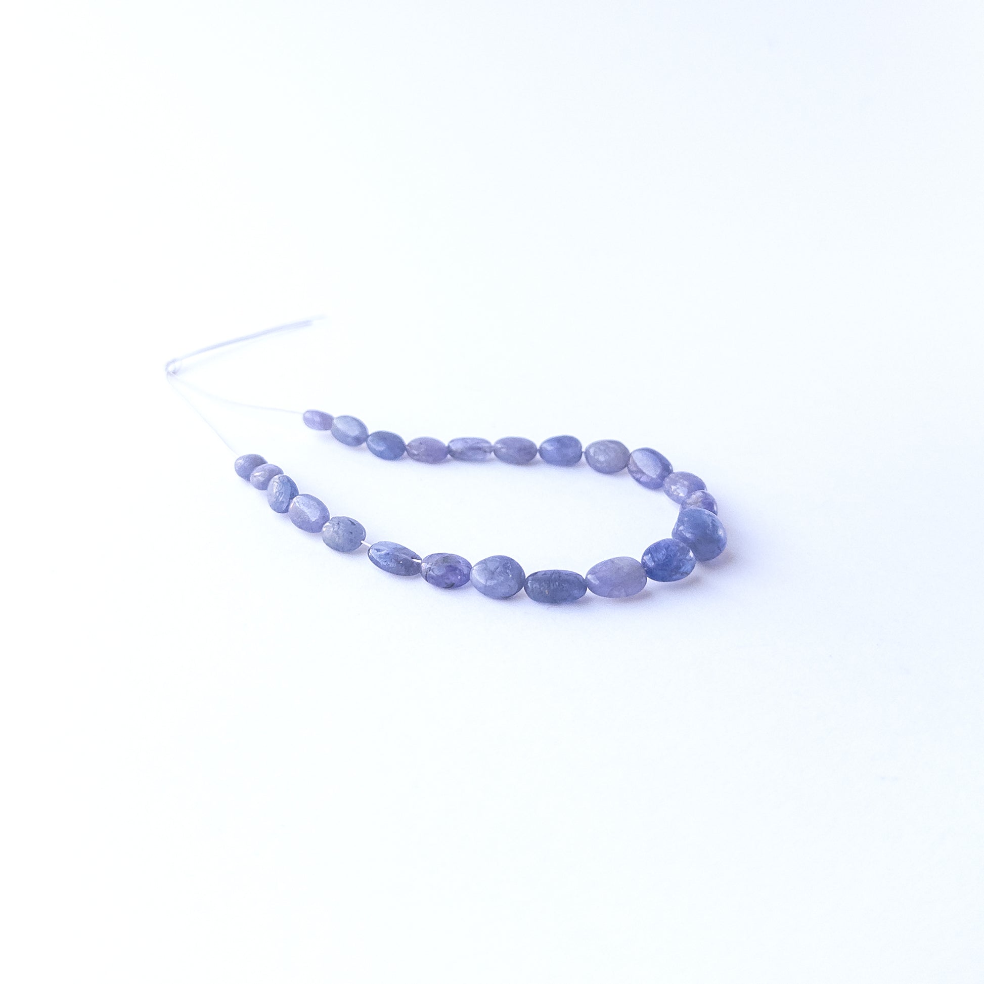Authentic Blue Sapphire oval stone beads with rich blue tones, ideal for DIY jewellery and beadwork.