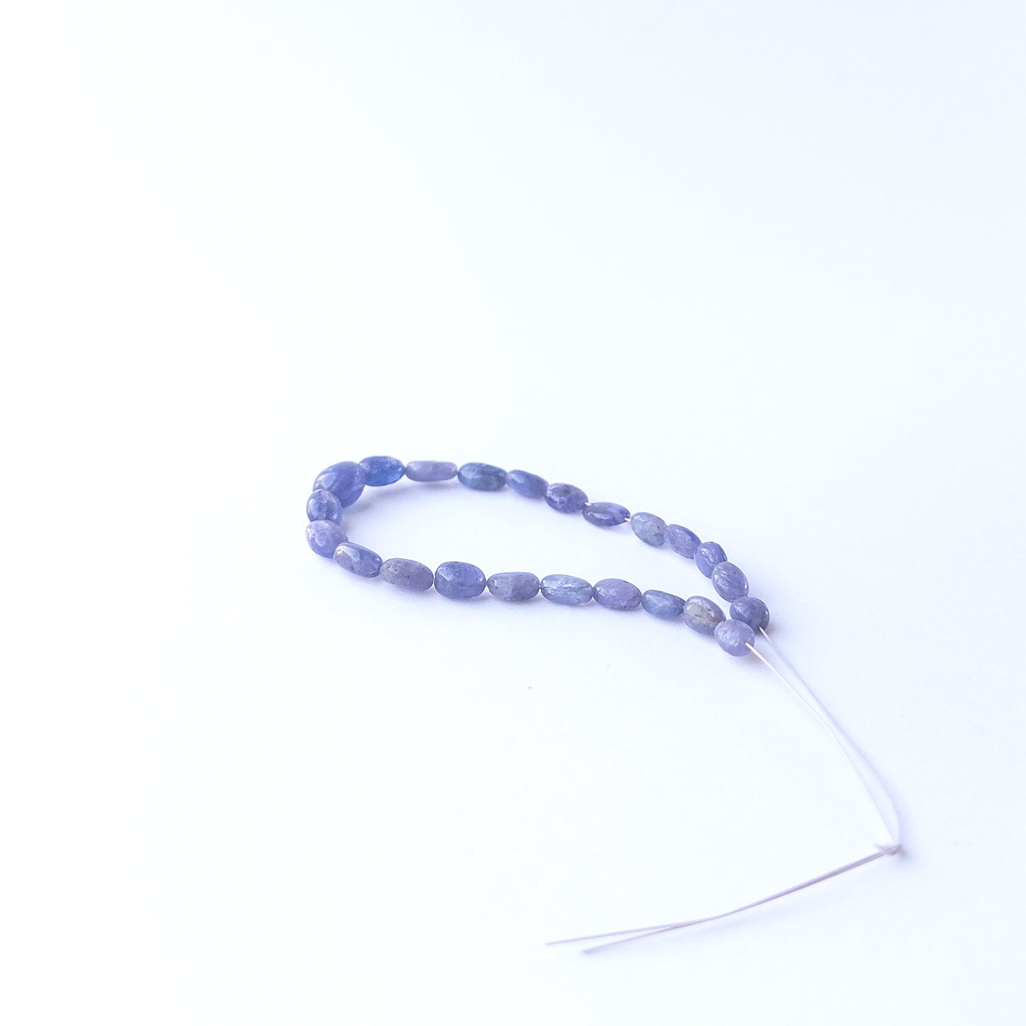 Genuine Blue Sapphire gemstone beads with smooth oval cut, perfect for artisan jewellery designs.