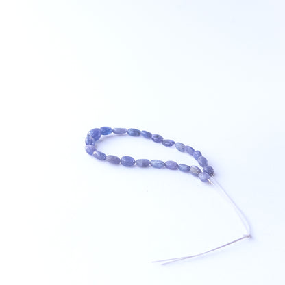 Genuine Blue Sapphire gemstone beads with smooth oval cut, perfect for artisan jewellery designs.