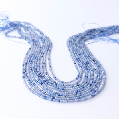 Authentic Blue Shaded Chalcedony gemstone beads showing subtle colour shifts and sparkle for beadwork.