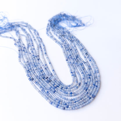 High‑quality Blue Chalcedony rondelle beads arranged neatly for gemstone jewellery making.
