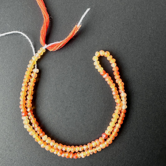 Natural gemstone beads featuring Carnelian with precision faceting and warm, vibrant colour.