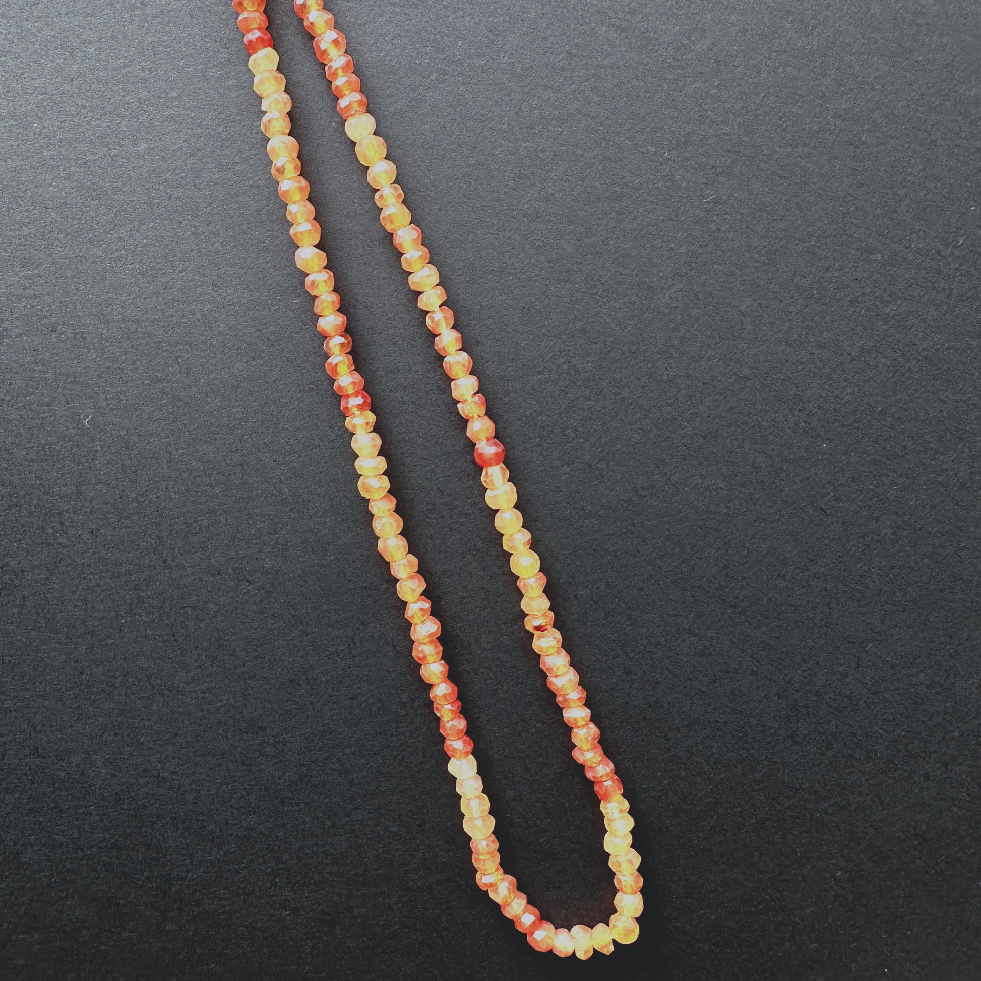 Handmade jewellery components made from 3.5mm Carnelian beads with 0.4mm drilled holes.