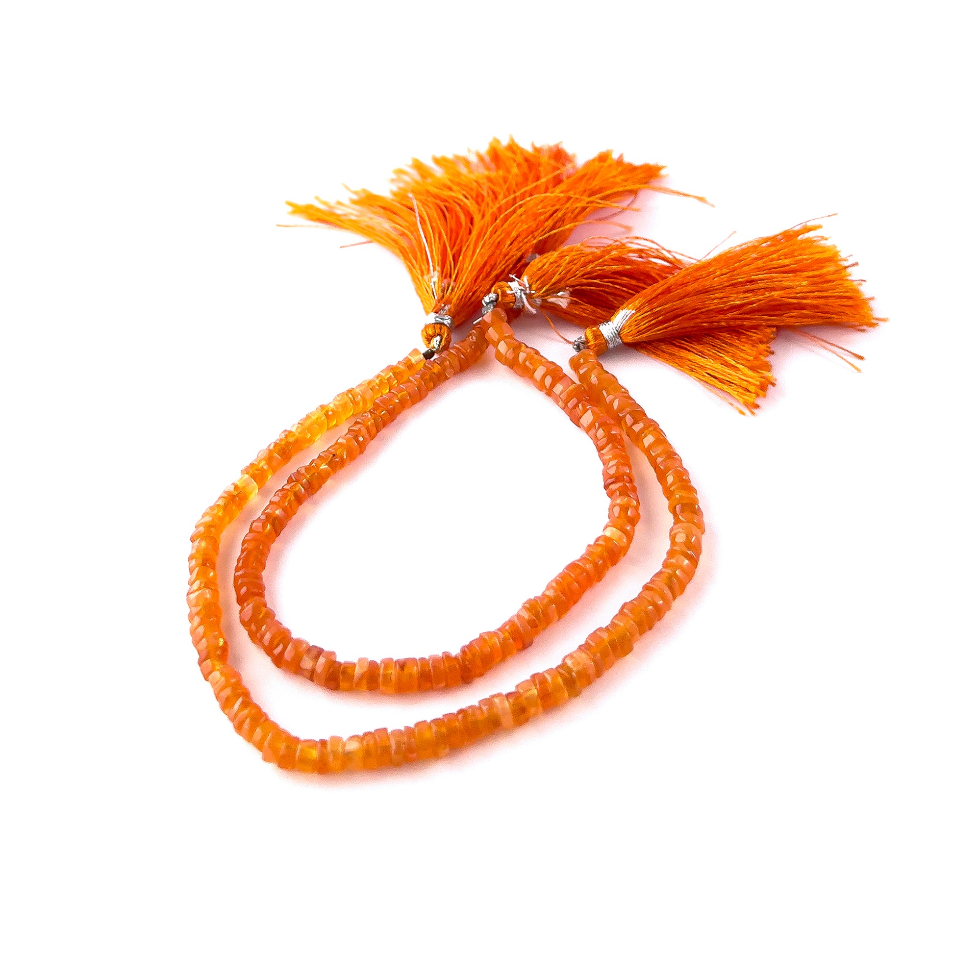 Authentic Carnelian stone beads in smooth wheel heishi cut, ideal for DIY jewellery and artisan beadwork.