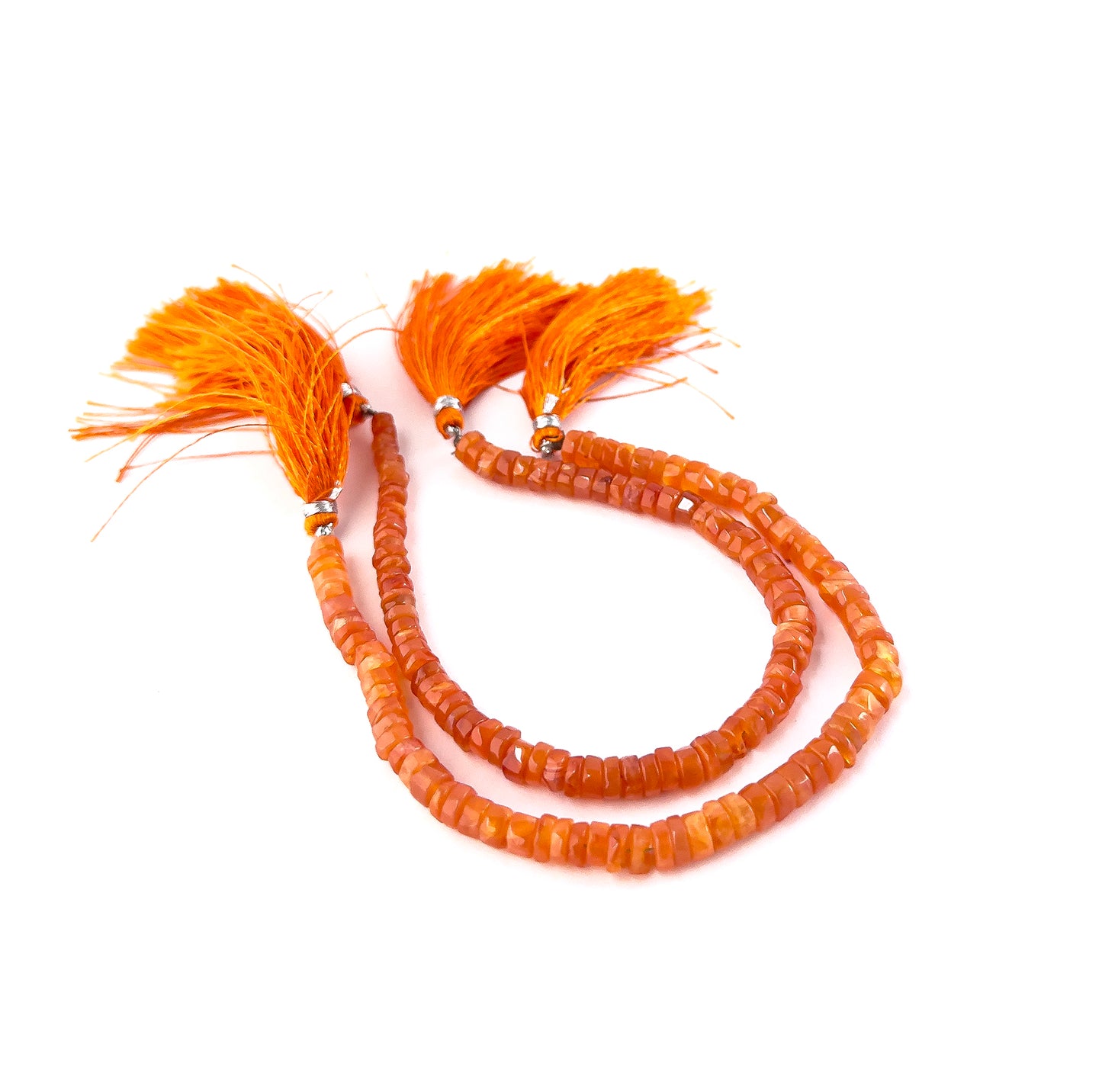 Carnelian smooth wheel heishi beads sized 4.8–8.5mm arranged in a 20cm strand, showing warm orange‑red tones and a polished finish.