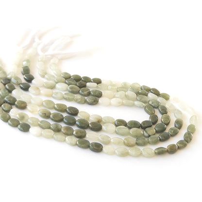 High‑quality smooth oval Cat’s Eye beads with polished shine and uniform arrangement ideal for handcrafted jewellery.