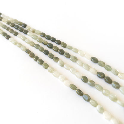 Natural Cat’s Eye gemstone beads with soft reflective sheen and premium clarity for elegant stone bead designs.