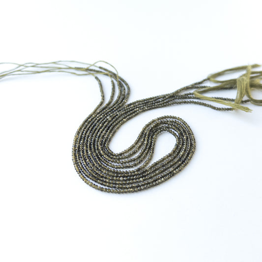 Authentic Cat's Eye gemstone beads showcasing polished facets ideal for handmade jewellery components.