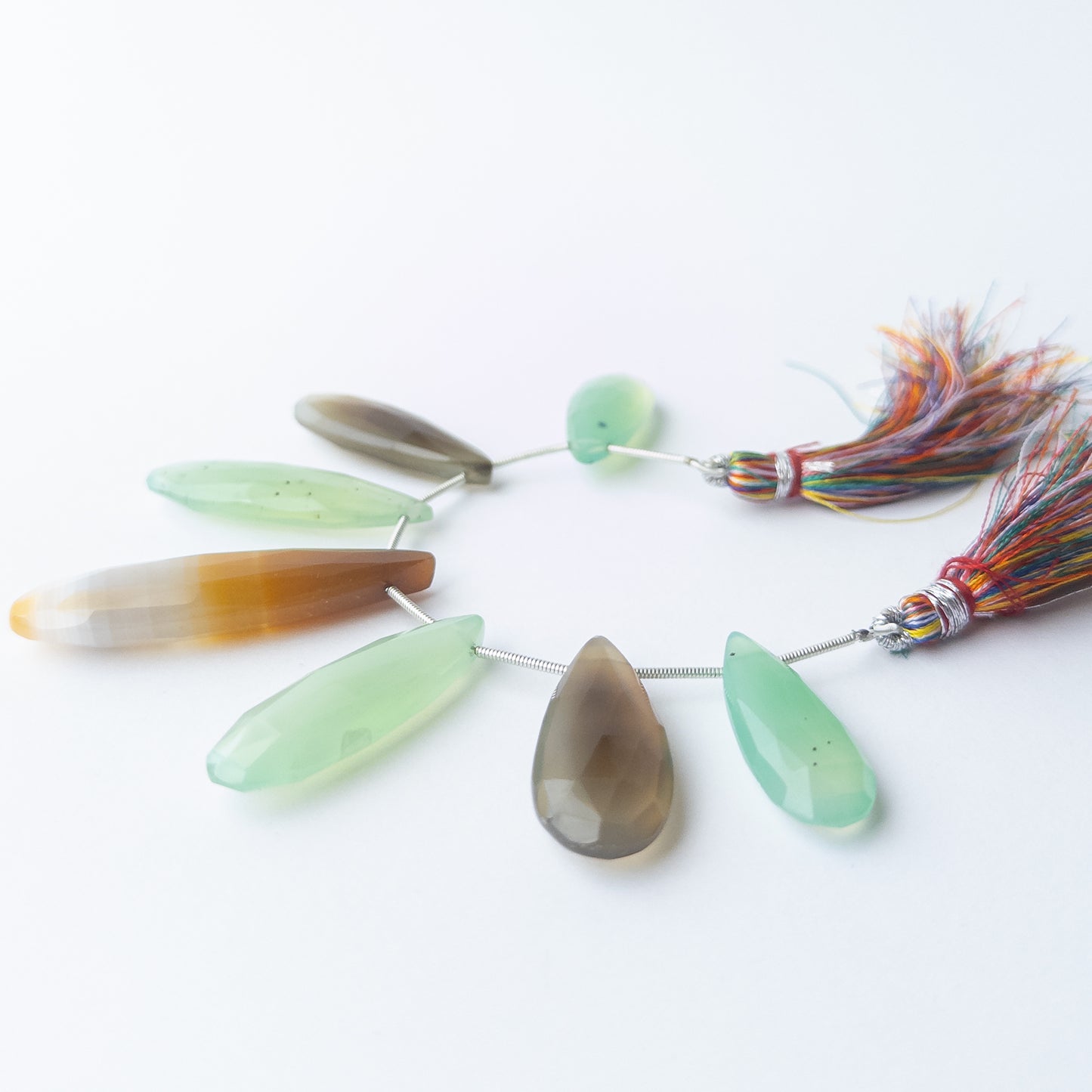 Genuine Chalcedony gemstone beads with faceted briolette cut, perfect for artisan jewellery designs.