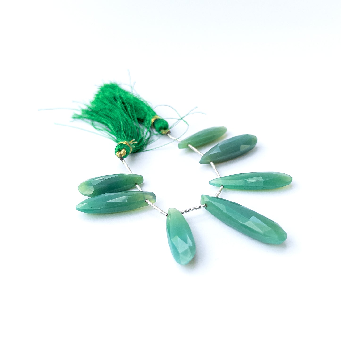 Authentic Chalcedony gemstone beads featuring elongated faceted briolette cuts ideal for DIY jewellery making.