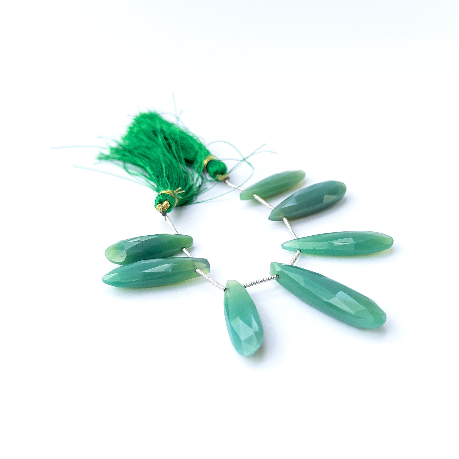 Authentic Chalcedony gemstone beads featuring elongated faceted briolette cuts ideal for DIY jewellery making.