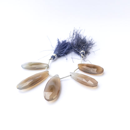 Authentic Chalcedony gemstone beads featuring elongated faceted briolette cuts ideal for DIY jewellery making.