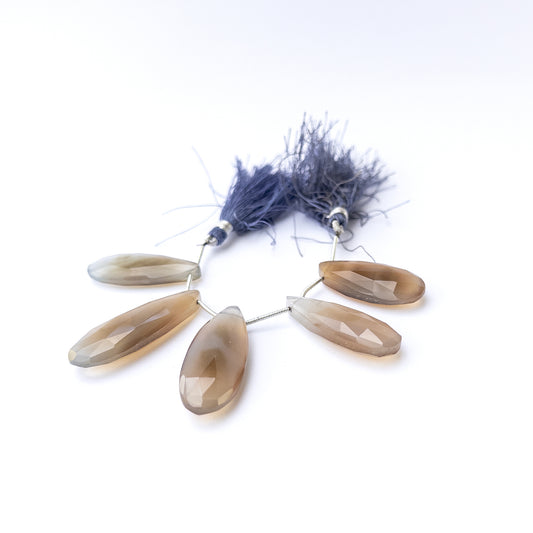 Authentic Chalcedony gemstone beads featuring elongated faceted briolette cuts ideal for DIY jewellery making.