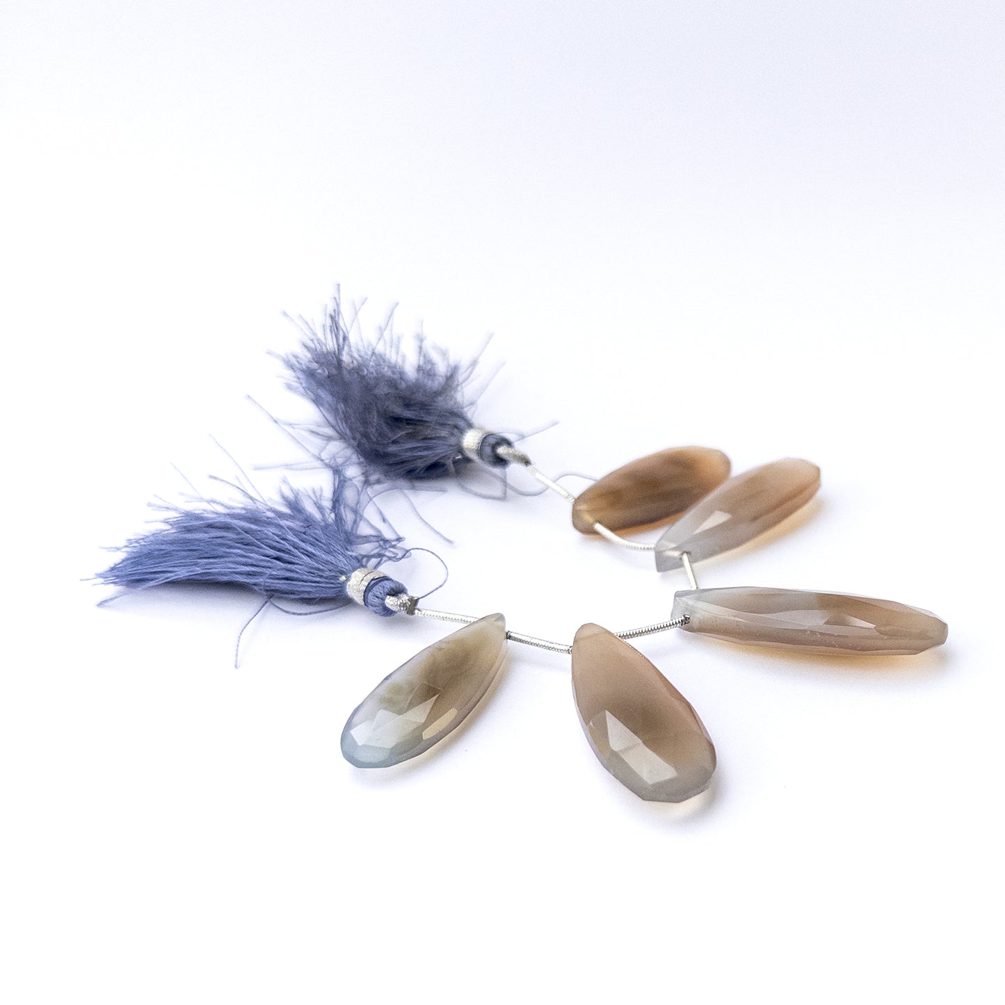 Natural Chalcedony stone beads with sparkling faceted briolette shapes, perfect for artisan jewellery components.