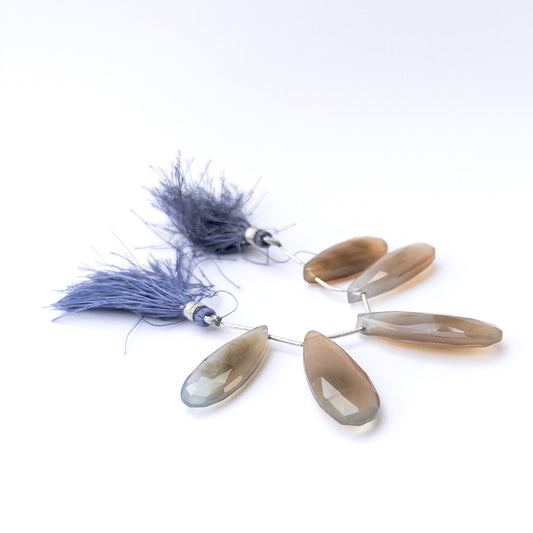 Natural Chalcedony stone beads with sparkling faceted briolette shapes, perfect for artisan jewellery components.