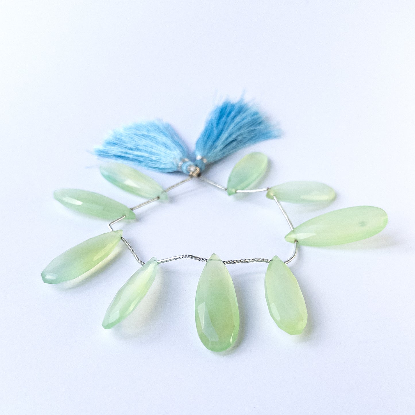 Authentic Chalcedony gemstone beads featuring elongated faceted briolette cuts ideal for DIY jewellery making.