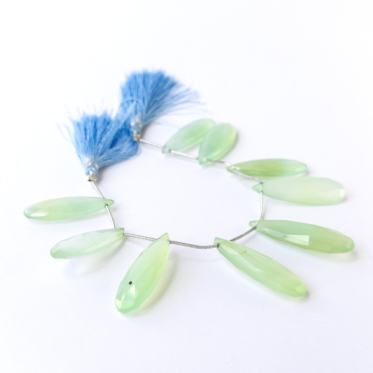 Natural Chalcedony stone beads with sparkling faceted briolette shapes, perfect for artisan jewellery components.