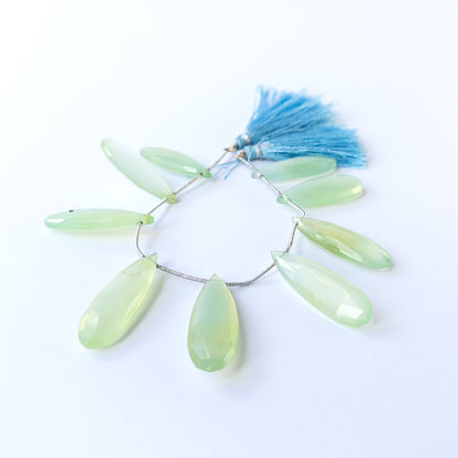 Genuine Chalcedony gemstone beads showcasing polished faceted briolette cuts in mixed 34–36mm lengths.