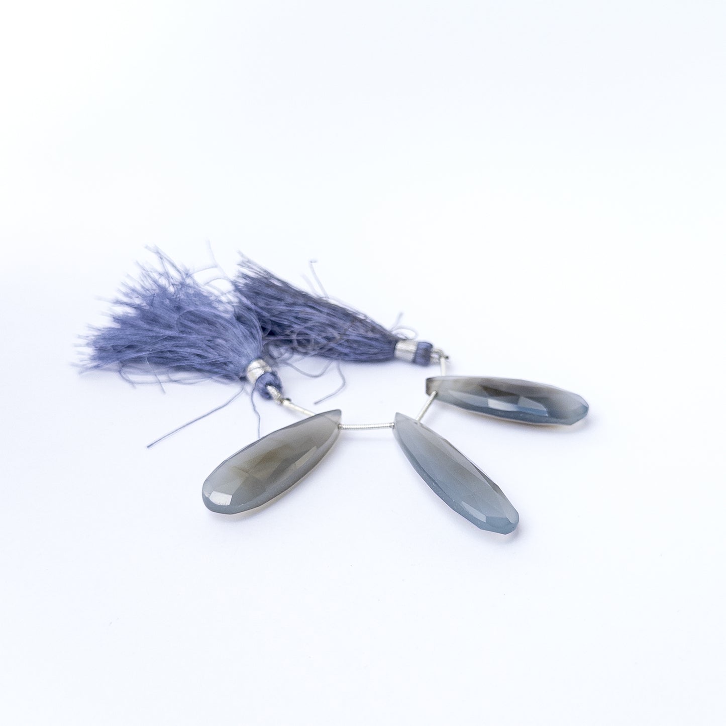 Authentic Chalcedony gemstone beads featuring elongated faceted briolette cuts ideal for DIY jewellery making.