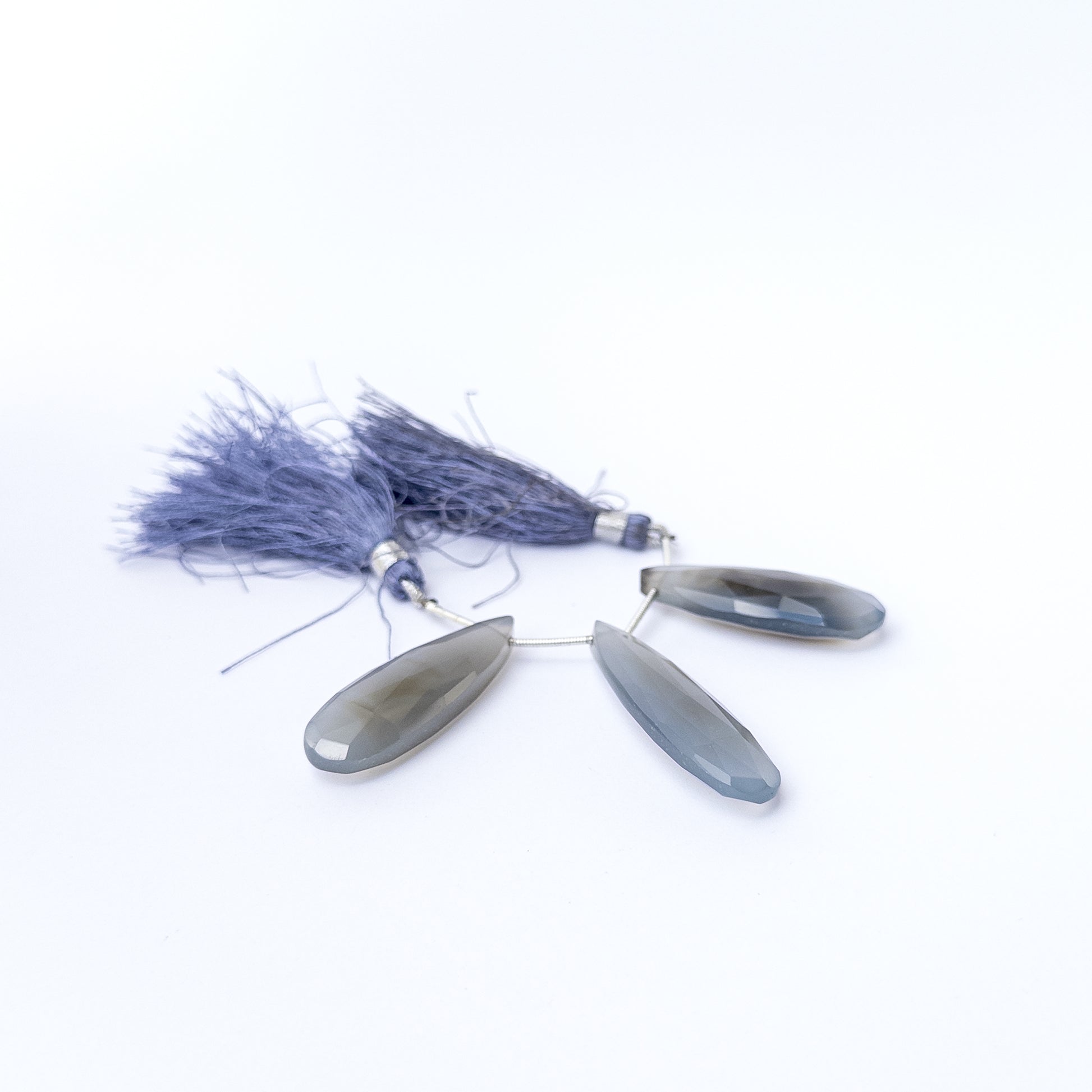 Authentic Chalcedony gemstone beads featuring elongated faceted briolette cuts ideal for DIY jewellery making.