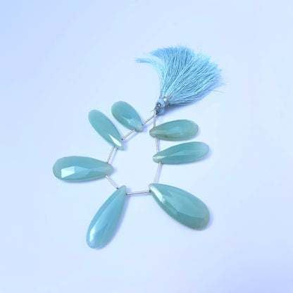 Natural Chalcedony stone beads arranged in a set of 7 with faceted finish.