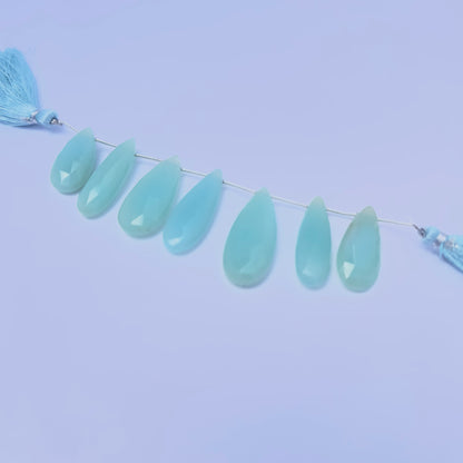 Handmade jewellery components featuring Chalcedony faceted long pear briolette beads.