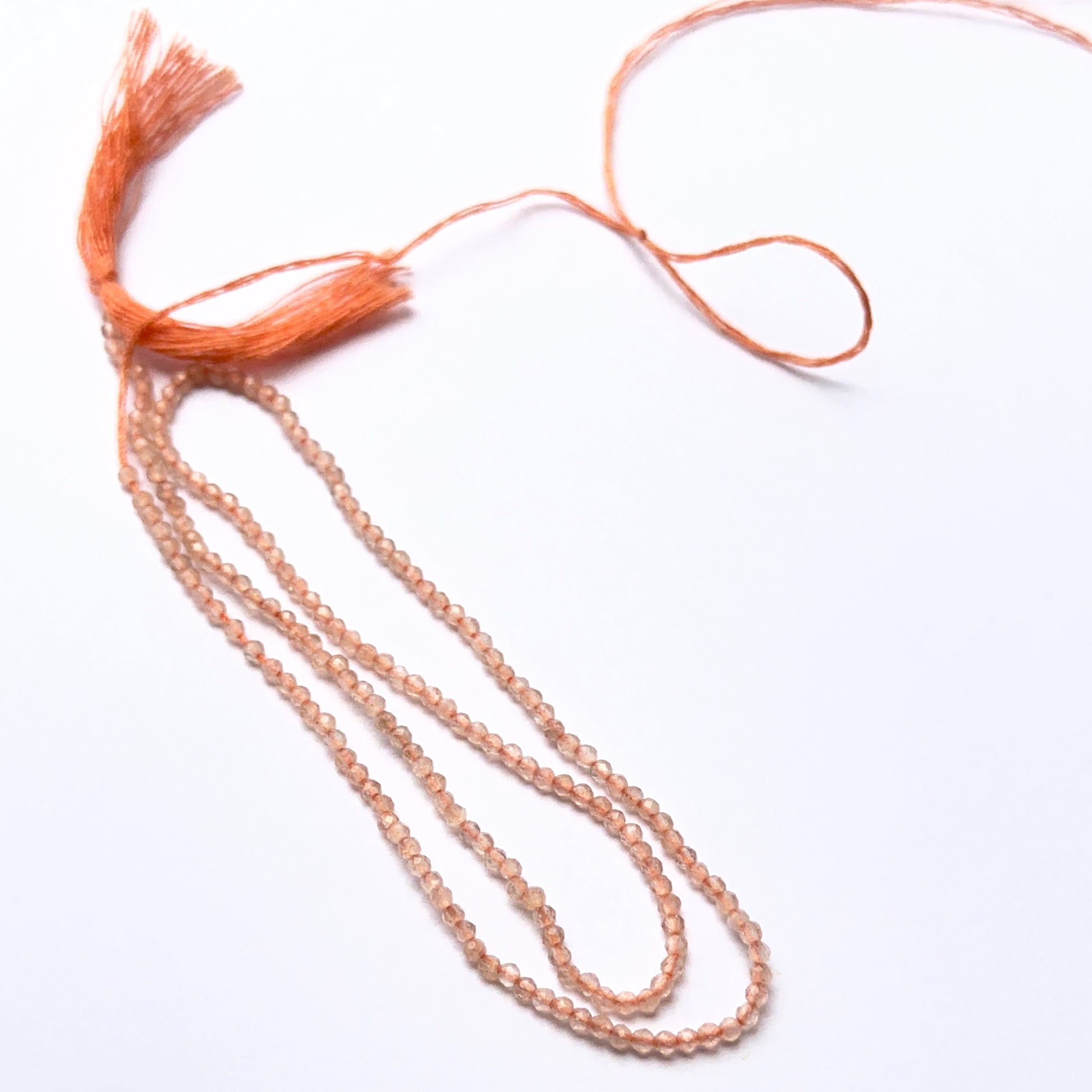 Chalcedony faceted rondelle natural gemstone beads in 1.9mm on a 33cm strand, showing soft translucent sparkle for DIY jewellery.