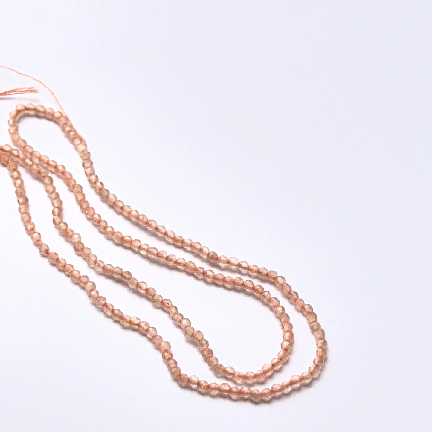 Chalcedony natural gemstone beads in micro faceted rondelle shape, ideal for delicate artisan jewellery and DIY beadwork.