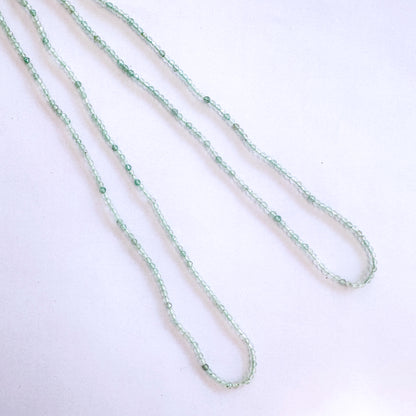 Chalcedony faceted rondelle beads in 2.1-2.3mm size, 32cm strand with soft green tones and delicate sparkle for elegant jewellery designs.