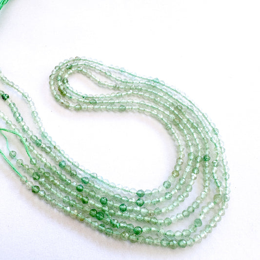 Chalcedony gemstone beads with subtle shimmer and precision-cut rondelle shape.