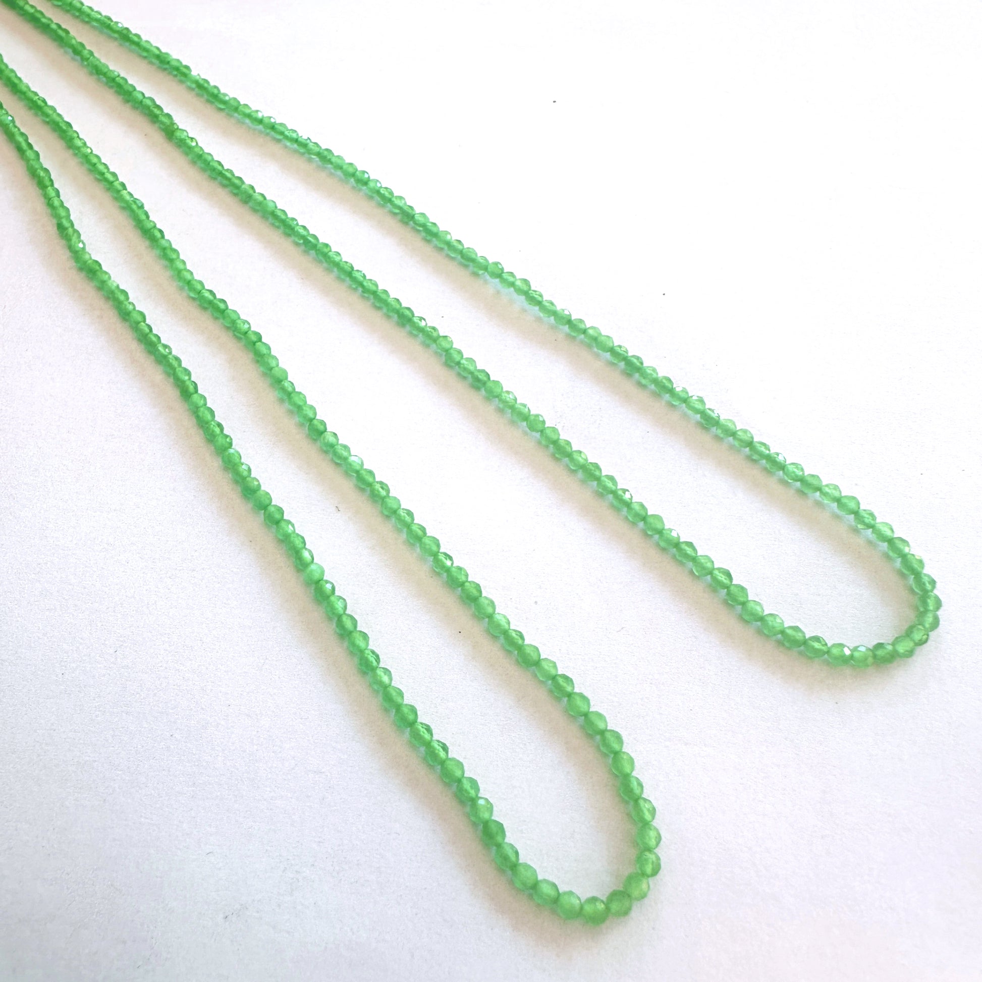Faceted chalcedony beads arranged in a 38cm strand with consistent sizing and elegant polish.