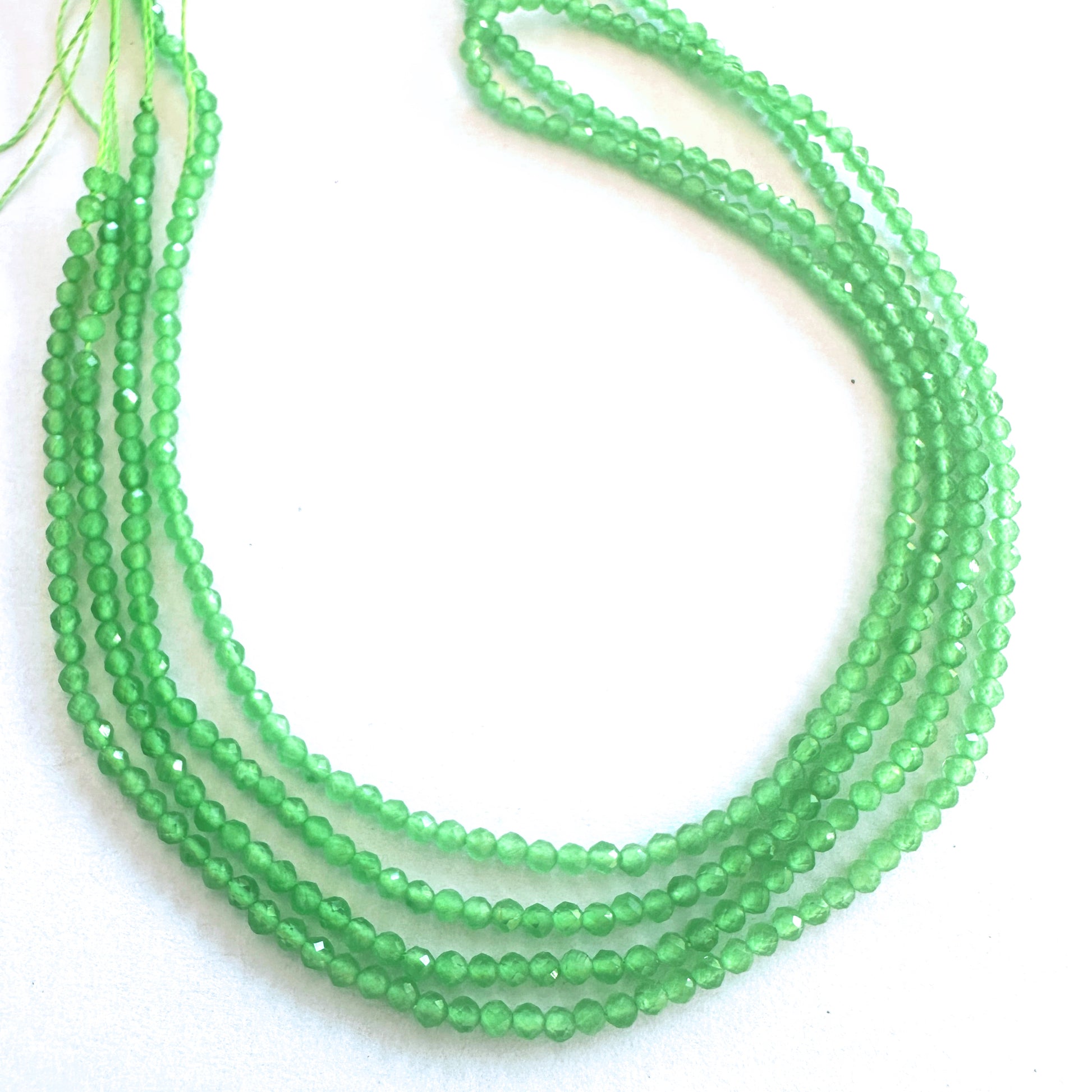 Chalcedony faceted rondelle beads in 2.2mm size sparkle gently across a 38cm strand.
