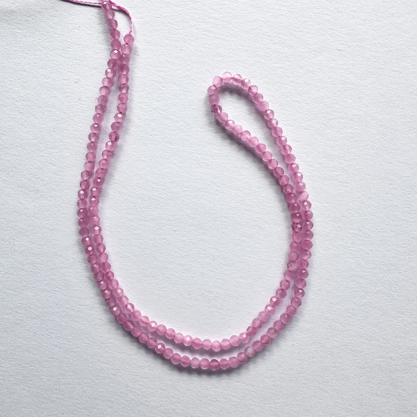 Handmade jewellery components made from 2.6mm Chalcedony beads with 0.4mm drilled holes.