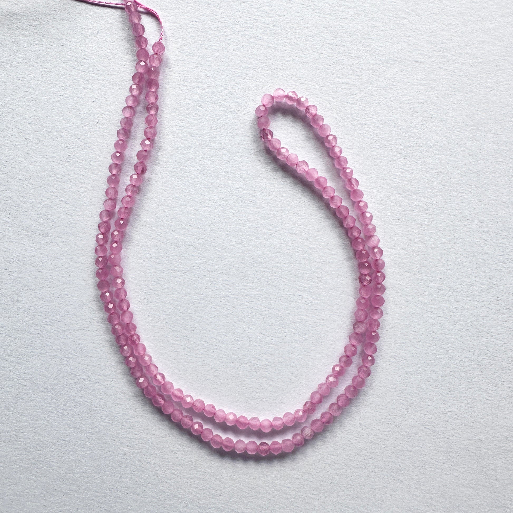 Handmade jewellery components made from 2.6mm Chalcedony beads with 0.4mm drilled holes.
