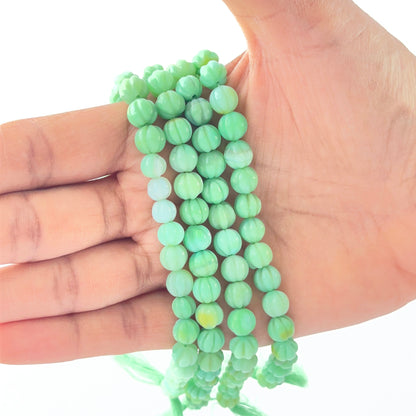 Handmade jewellery components with 8.5mm pumpkin-cut Chalcedony for artisan jewellery.