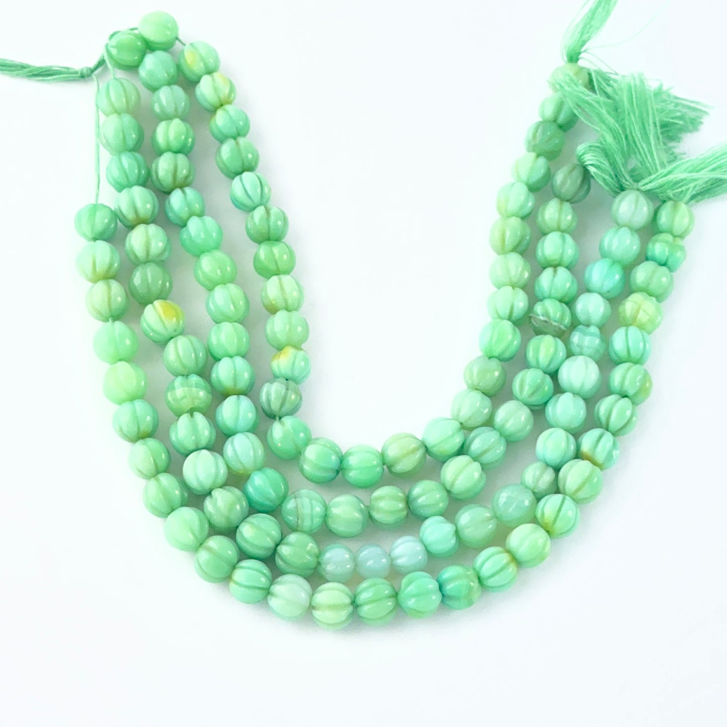 Natural gemstone beads for DIY jewellery featuring 7-8mm carved Chalcedony stones