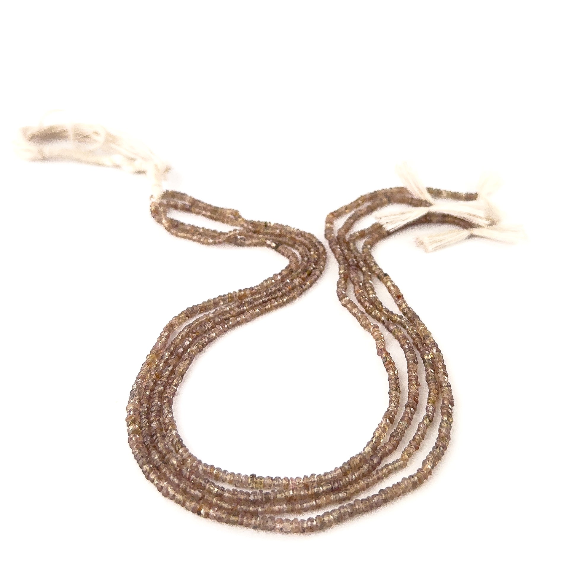 Change Garnet gemstone rondelles in 3mm size, offering rich colour variation and polished faceting across a 35cm strand.