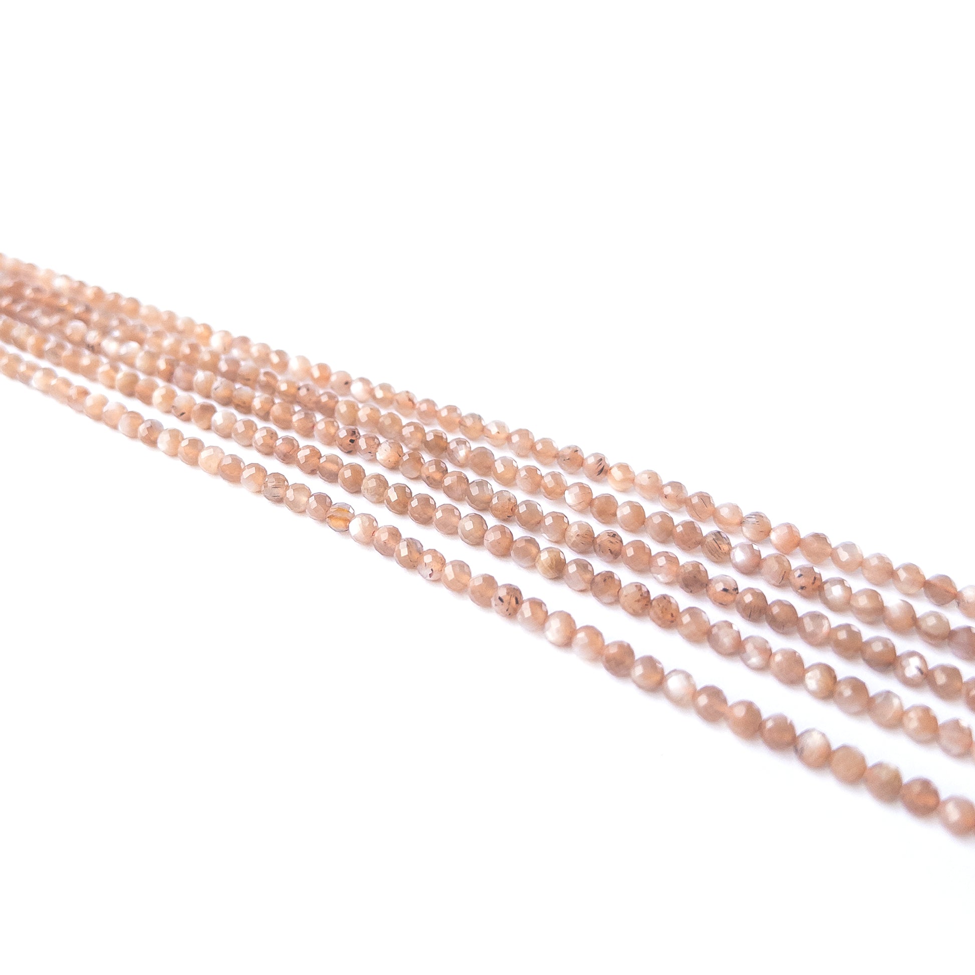Chocolate Moonstone faceted rondelle gemstone beads arranged in a warm neutral strand for handmade jewellery making.