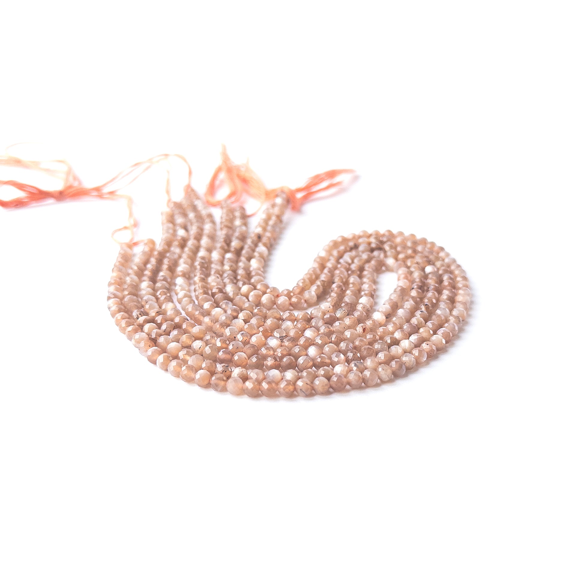 Close‑up of genuine Chocolate Moonstone faceted rondelle beads showing sparkling facets and natural earthy tones.